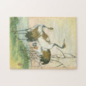 Orientale kranen door het water legpuzzel (Horizontaal)