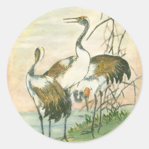 Orientale kranen door het water ronde sticker