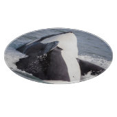 Orka walvis doorbreekt het wateroppervlak snijplank (Hoek)
