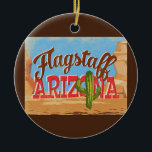 Ornament Arizona Desert Vintage<br><div class="desc">Flagstaff Arizona neo vintage reisontwerp in een grappige cartoon retro-stijl met de woestijn,  een cactus en rotsen. Blauw,  bruin en rood met groene cactus.</div>