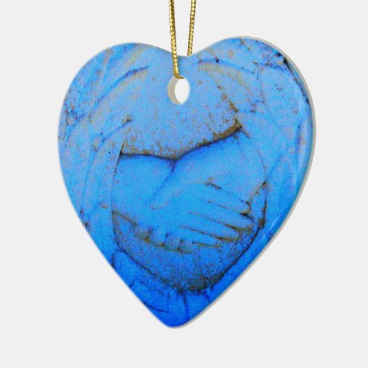 ornament met ingeklemde handen (Links)