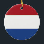 Ornament met vlag van Nederland<br><div class="desc">Verlicht uw vakantieseizoen met Dutch Pride met behulp van ons feestelijke kerstornament met de vlag van Nederland! Doordrenk uw vakantiedecor met de spirit van Nederland met ons zorgvuldig vervaardigde ornament, versierd met het levendige design van de Nederlandse vlag. De vetgedrukte rode, witte en blauwe kleuren, gerangschikt in horizontale strepen, leggen...</div>
