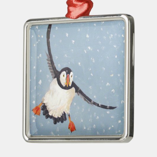 ornament op het plein "Een speelse Puffin" (Links)
