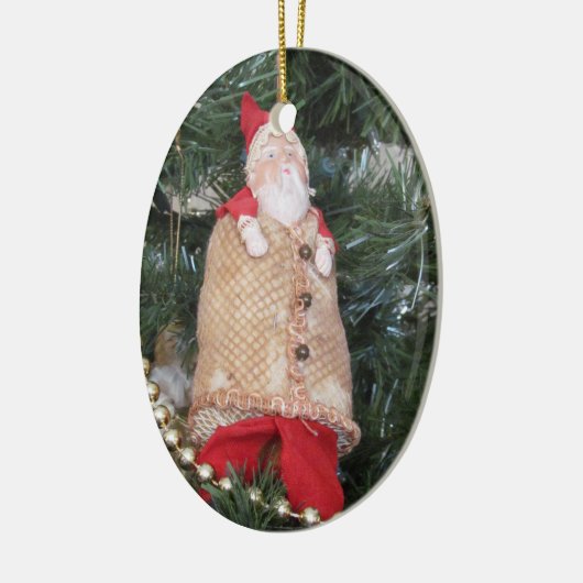 Ornament - (ovl) - Antiek kerstman in de boom (Links)