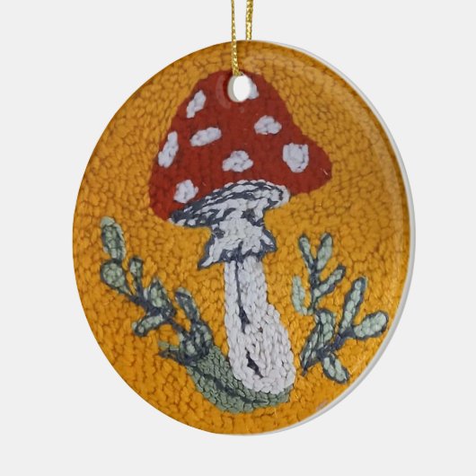 ornament van de paddenstoel van het tapijthaak (Links)
