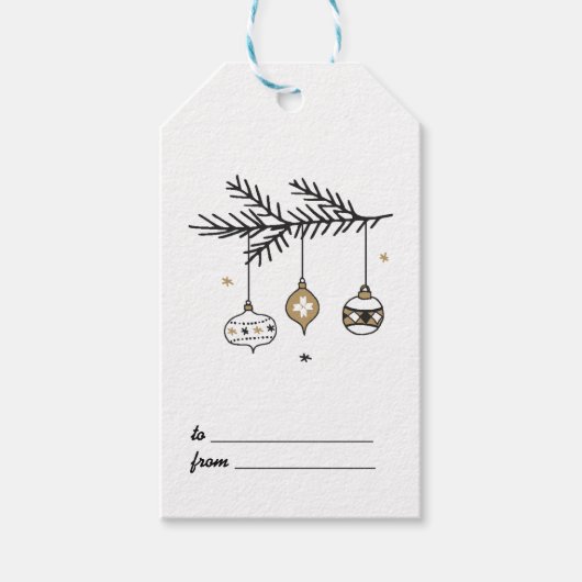Ornamenten op een branche met kerst/feestdag cadeaulabel (Voorkant)