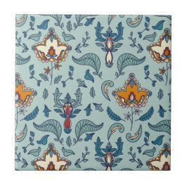 Ornate floral pattern on a pale blue background tegeltje