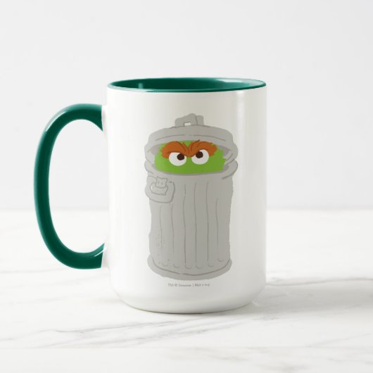 Oscar the Grouch & z'n vuilnisbak Mok (Links)