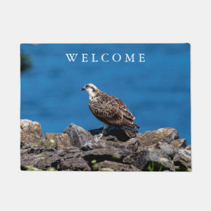 Osprey op de rotsen deurmat