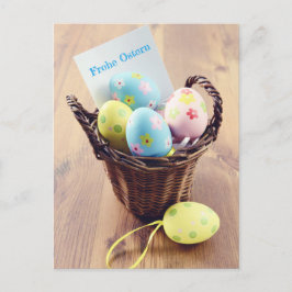 Ostereier in einem Korb mit Notizzettel Briefkaart