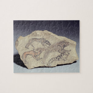 Ostracon met een hond die een hyena achtervolgt (l legpuzzel