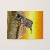 Otter eet smakelijke vis bij zijn vijver, legpuzzel (Horizontaal)