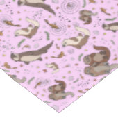 Otters in roze tafelkleed (Gekanteld)