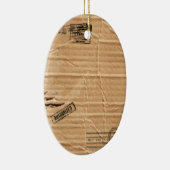 oud beschadigd bruin karton met riemen en zolen keramisch ornament (Rechts)