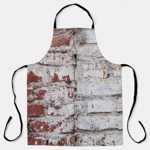 Oud geschilderde bakstenen wand met een witte schi schort