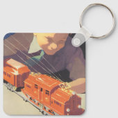 Oud Kerstmis, Jongen speelt met speelgoedtreinen Sleutelhanger (Achterkant)