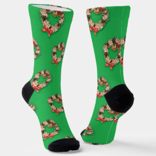 Oud kerstpatroon, bloemenslingers op groen sokken