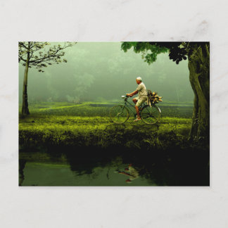 Oud man op een fiets briefkaart