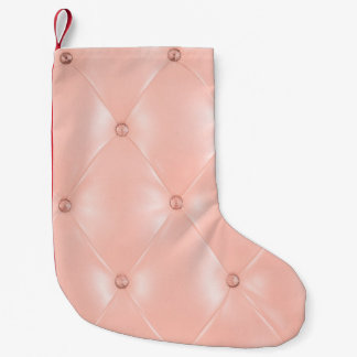 Oud roos, roze, achtergrond en textuur met leder kleine kerstsok