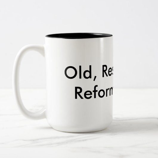 Oud, rust, hervormd. tweekleurige koffiemok (Links)