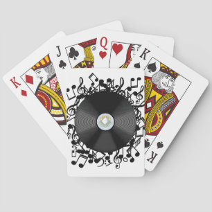 Oud vinylrecord en muzieknotities pokerkaarten