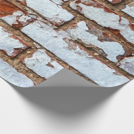 Oude  bakstenen wand met gestrooid wit gipsplaat cadeaupapier (Hoek)