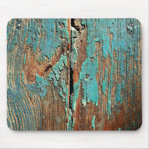 Oude blauwe verf op hout muismat