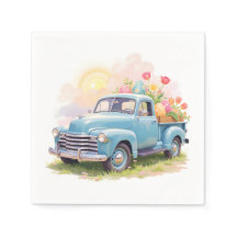 Oude blauwe vrachtwagen met paaseieren & tulpen