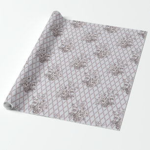 Oude bloemmotief cadeaupapier in stoffig roze