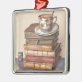 Oude  boeken en een kopje koffie metalen ornament (Links)