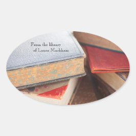 Oude boeken gestapeld ovale sticker