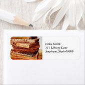 Oude boeken in een adreslabel van een stapel etiket (Insitu)