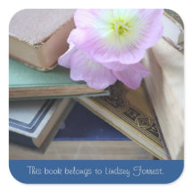 Oude boeken met sleutelbloem ex-libris