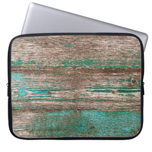 Oude bruinblauwe houten achtergrond met pellingpij laptop sleeve