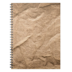Oude bruine doek: gestructureerde achtergrond. notitieboek