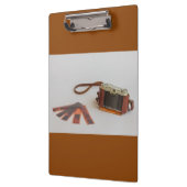 oude camera met negatief op klembord (Links)