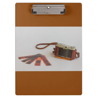 oude camera met negatief op klembord