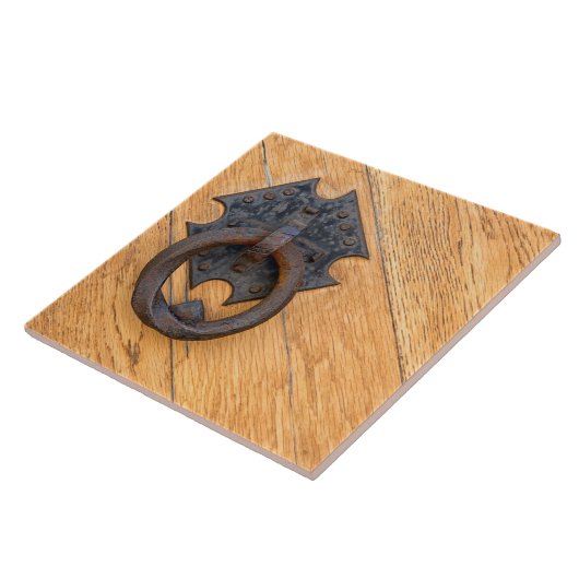 Oude deurklopper tegeltje (Zijkant)