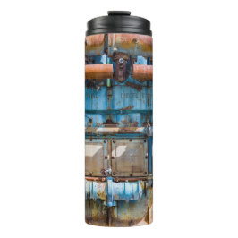 Oude en roestachtige atlas Imperial diesel engine Thermosbeker