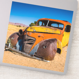 Oude en verlaten auto in Solitaire, Namibië Sticker