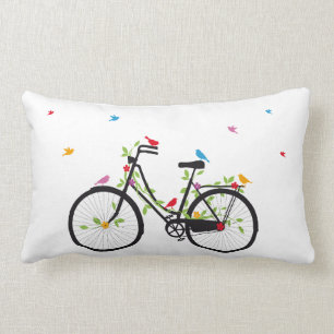 Oude  fiets met bloemen en vogels kussen