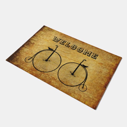 Oude  fietsen met fashioned deurmat (Schuin)