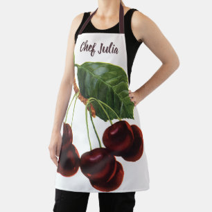 Oude fruitproducten, rijpe kersen van een boom schort