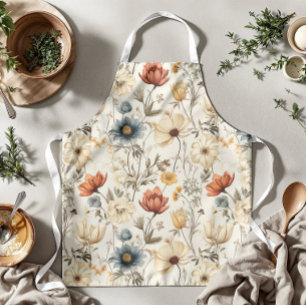 Oude gedroogde wilde bloem in terracotta en marine schort