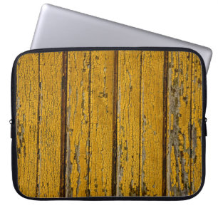 Oude gele deur of omheining met verschillende verf laptop sleeve