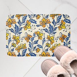 Oude gele oranje volksbloem in blauw blad badmat