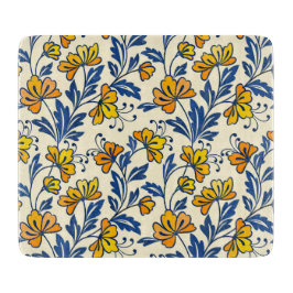 Oude gele oranje volksbloem in blauwe blad snijplank