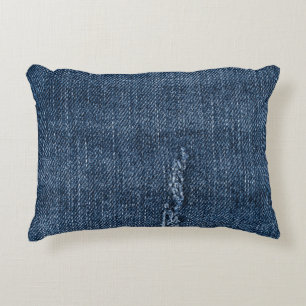 Oude gescheurde denim: jeans textuur. accent kussen