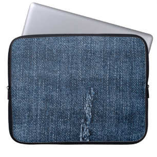 Oude gescheurde denim: jeans textuur. laptop sleeve