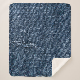 Oude gescheurde denim: jeans textuur. sherpa deken